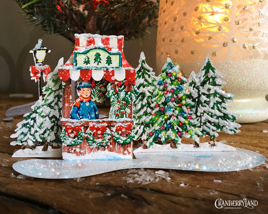 Le petit stand de Noël de M. Gus - Maison de village de Noël